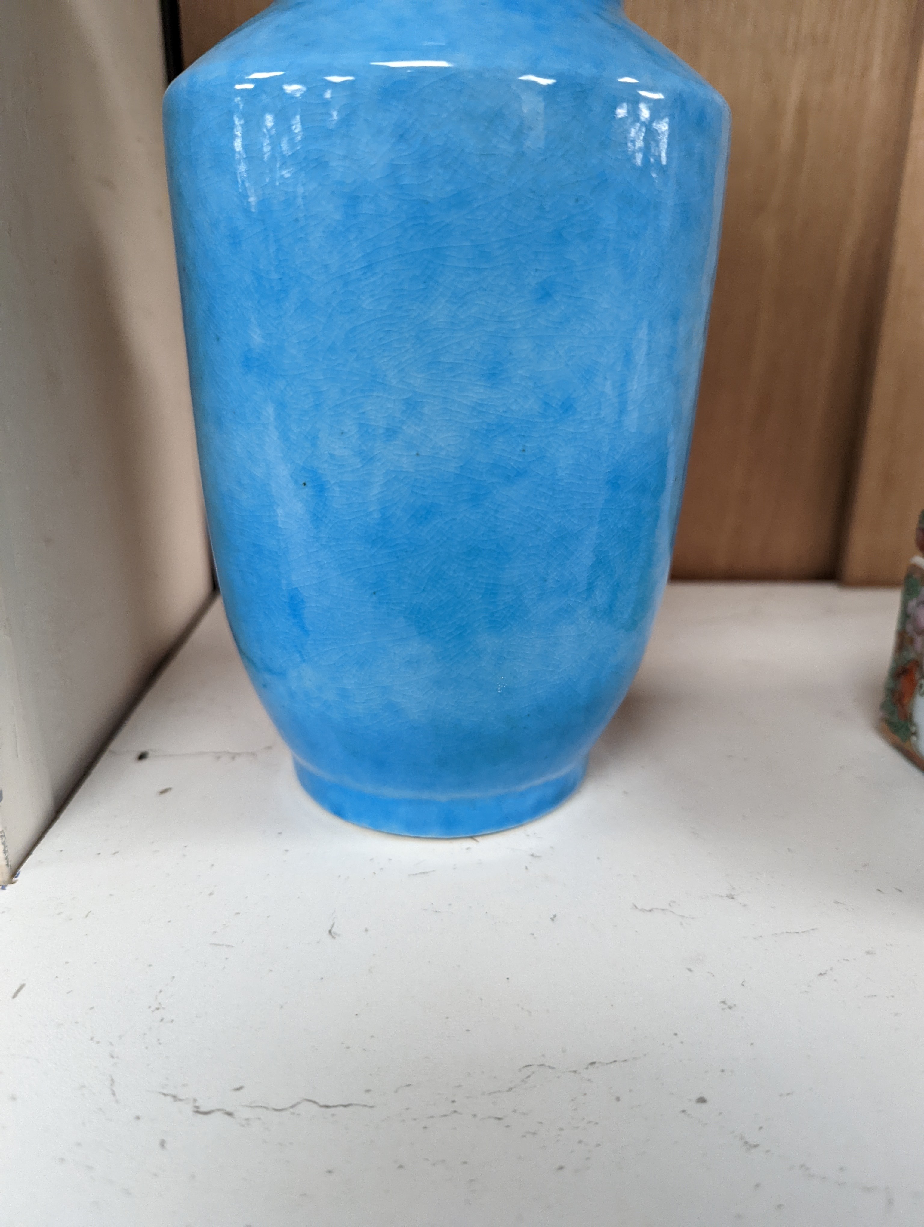 A Chinese turquoise glazed vase 22cm, with a fine crackle to the exterior glaze
